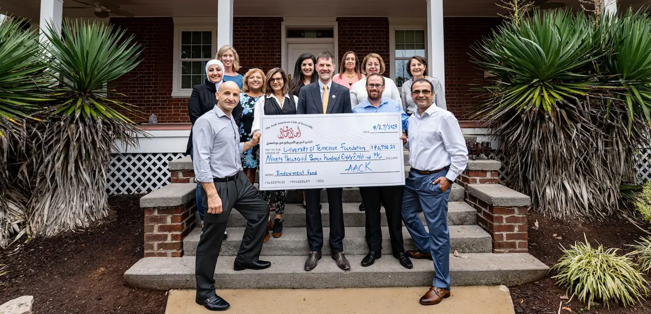 College of Science administration is presented with a large check from the Arab American Club of Knoxville